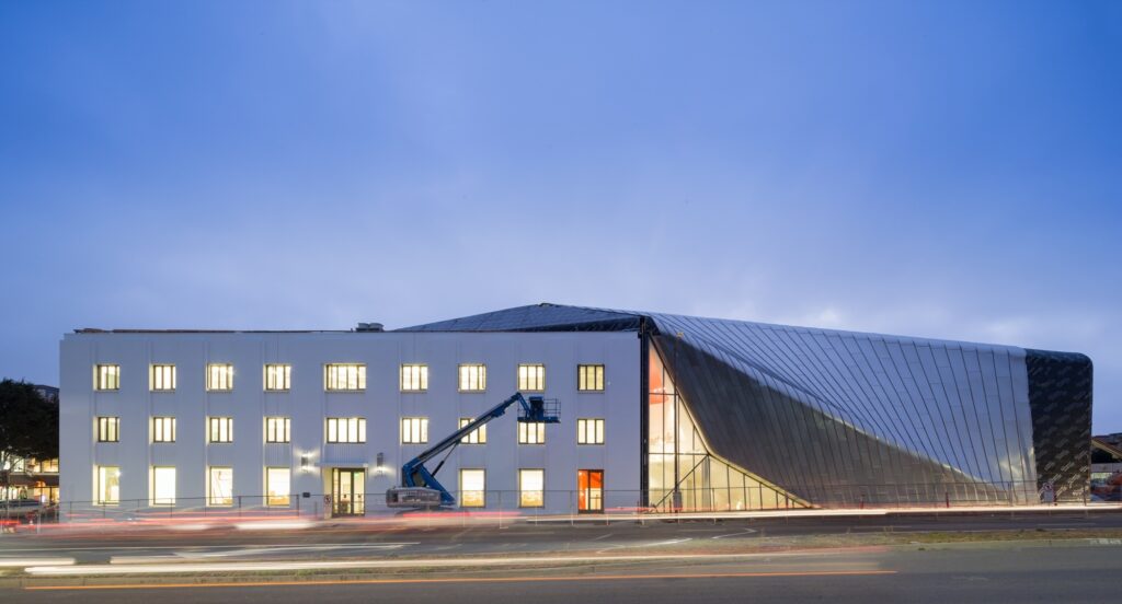Modern building with minimalist architecture at dusk.