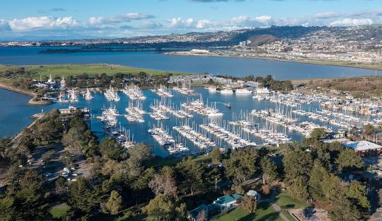Aerial view of a marina with boats docked.