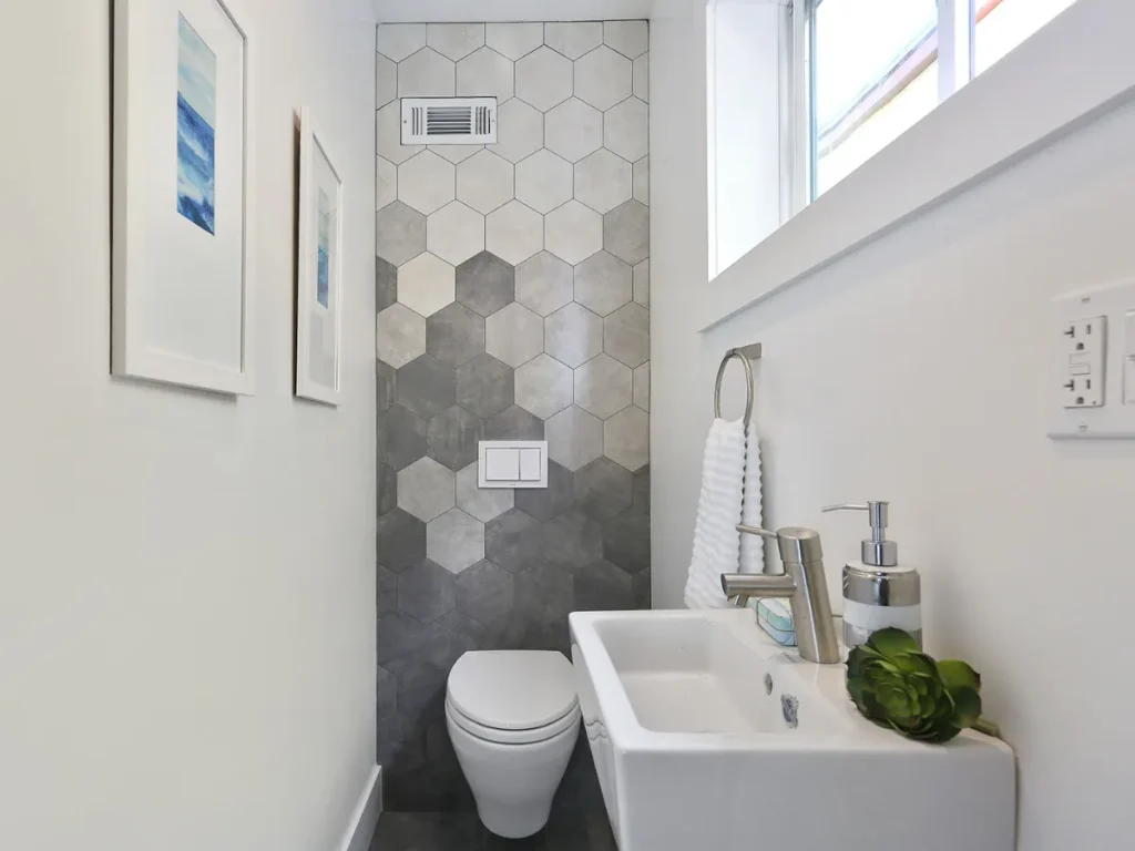 Modern bathroom with hexagonal tile design.