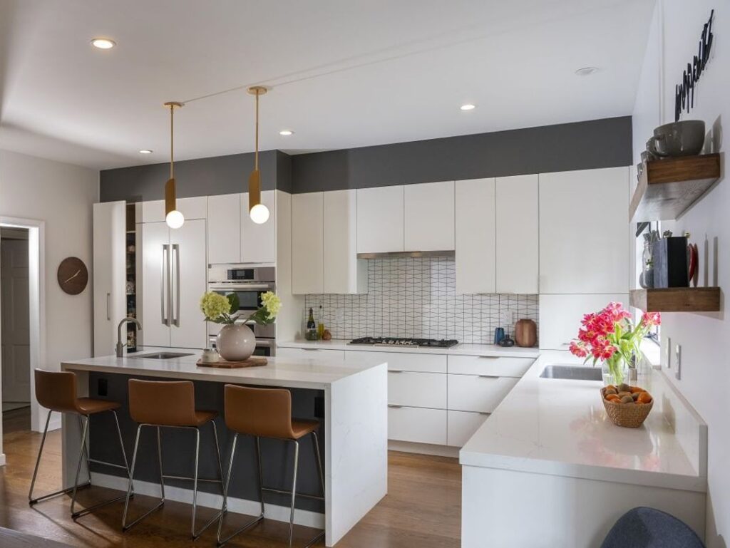 White kitchen island with dark cabinets