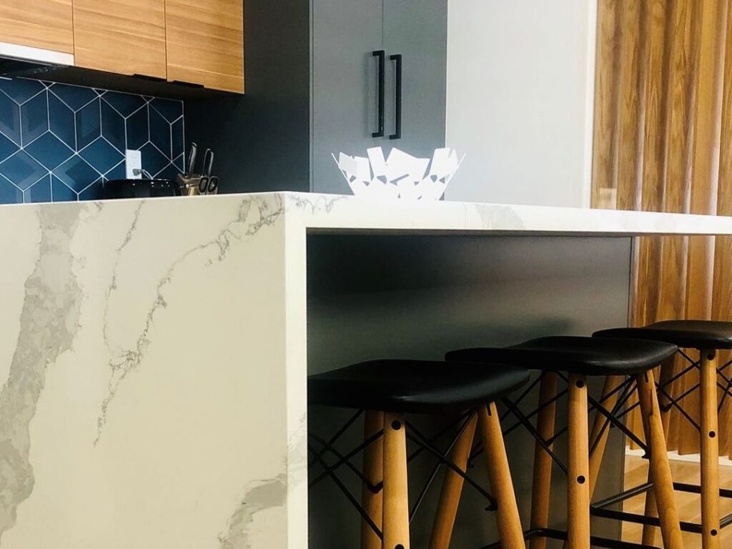 Modern living room with fireplace and dark accents