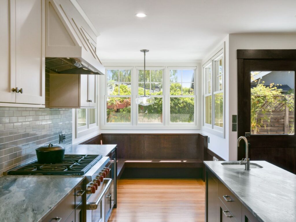 Bright kitchen with large open windows