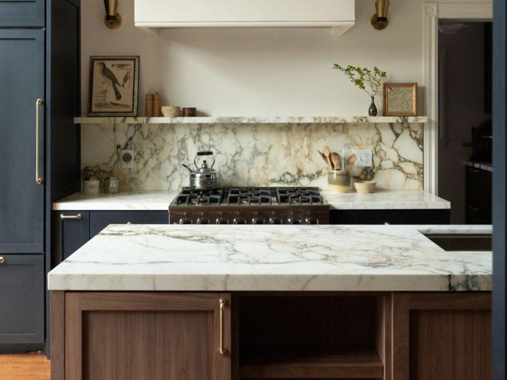 Kitchen with marble counters and wood cabinets